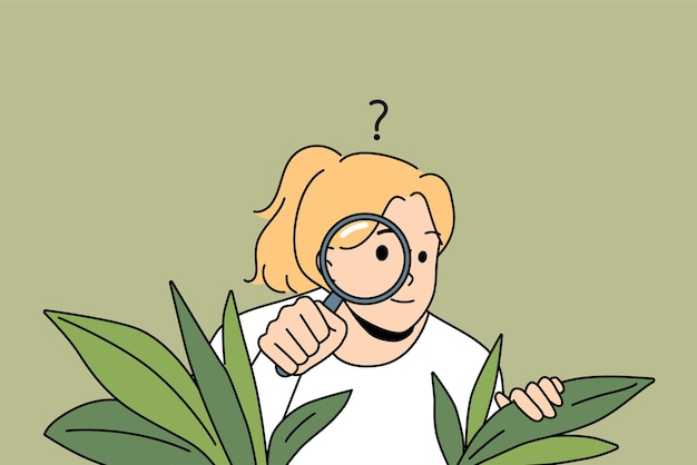 Curious woman with magnifier hide in bushes