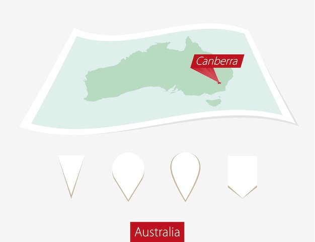 Vector curved paper map of australia with capital canberra on gray background four different map pin set