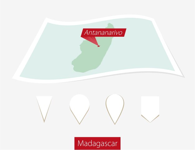 Vector curved paper map of madagascar with capital antananarivo on gray background