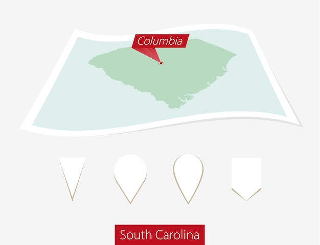 Vettore mappa cartacea curva dello stato della carolina del sud con la capitale columbia su sfondo grigio quattro diversi set di pin della mappa