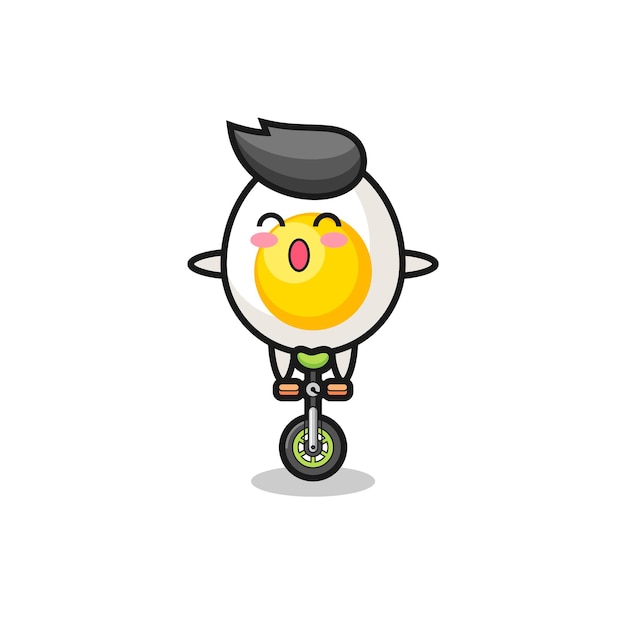 The cute boiled egg character is riding a circus bike