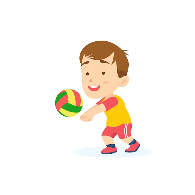 Cute boy passing volleyball