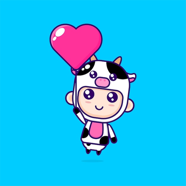 Cute cartoon boy wearing cow costume