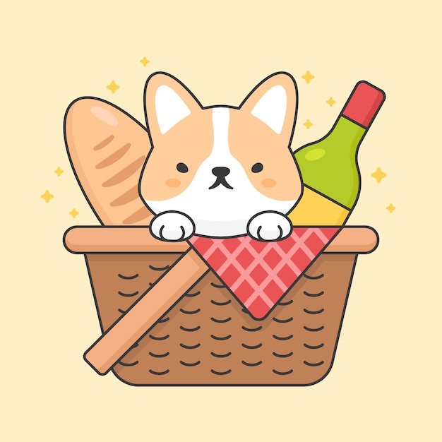 Cane sveglio del corgi in un cestino di picnic