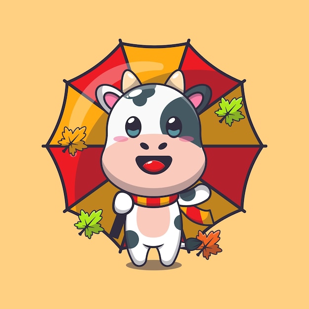 Cute cow with umbrella at autumn season