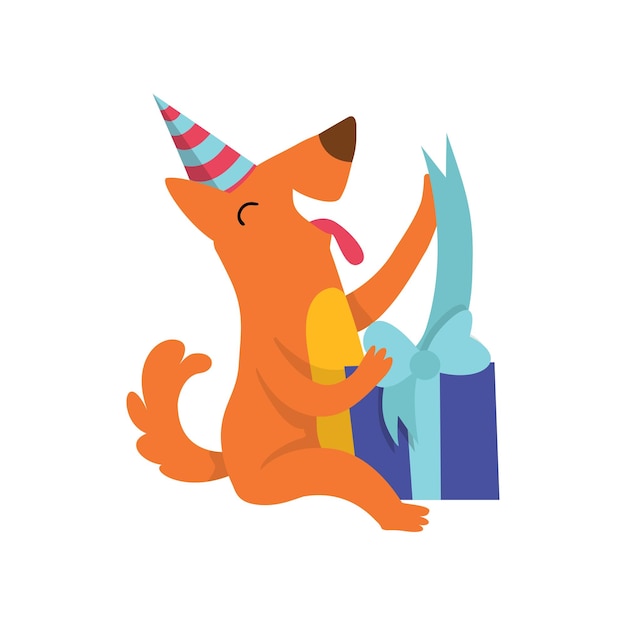 Милая собака в праздничной шляпе сидит на полу с подарочной коробкой, забавный персонаж мультфильма-животного на вечеринке по случаю дня рождения, векторная иллюстрация изолирована на белом фоне