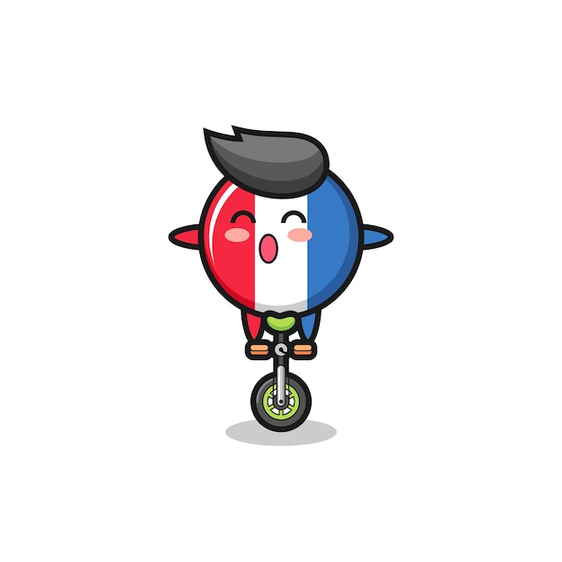 Симпатичный персонаж значка флага франции катается на цирковом велосипеде, милый стиль дизайна для футболки, наклейки, элемента логотипа