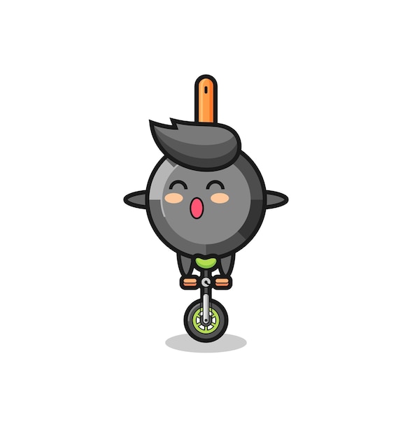 귀여운 프라이팬 캐릭터가 서커스 자전거를 타고 있습니다