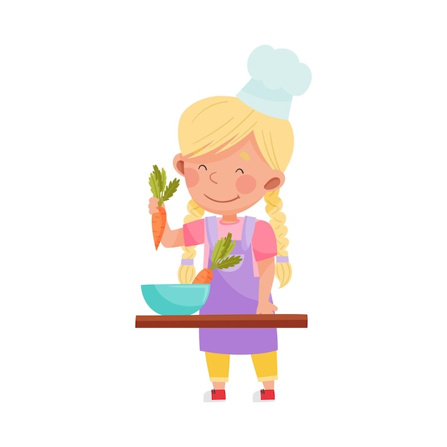 Cute Girl Character in Hat and Apron Standing at Kitchen Table and Cooking Salad Vector Illustration