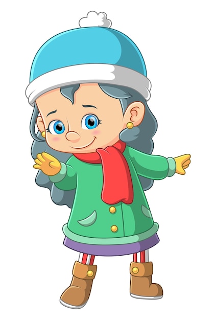 Cute girl wearing green winter coat and blue hat