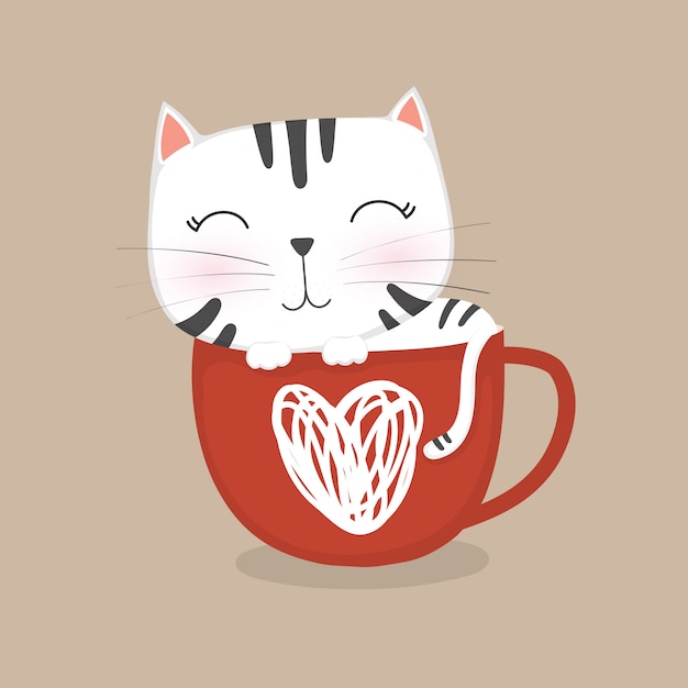 커피 컵에서 자 고 귀여운 고양이