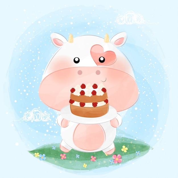 Cute little cow holding cake