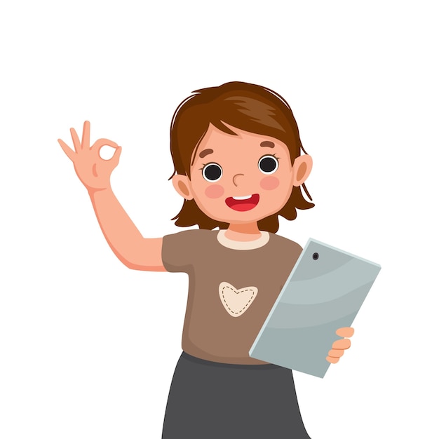 Cute little girl holding and using digital tablet smiling showing ok sign gesture