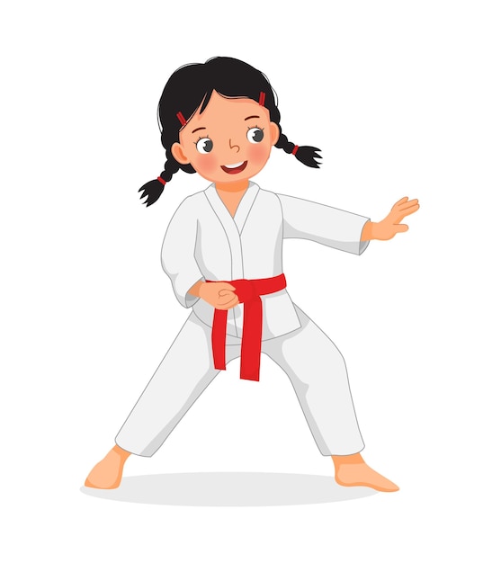 Cute little karate kid girl showing hand defense techniques\
poses in martial art training practice