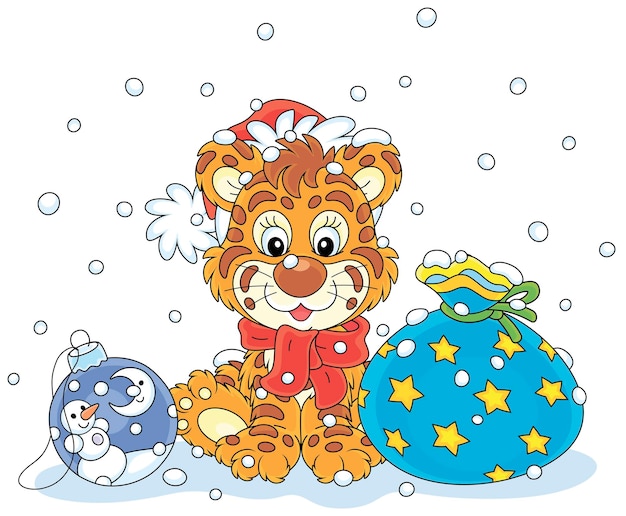 Cute little tiger in a Santa hat sitting on snow with a beautiful gift bag and a Christmas toy ball