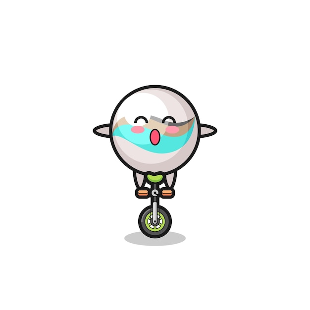 The cute marble toy character is riding a circus bike