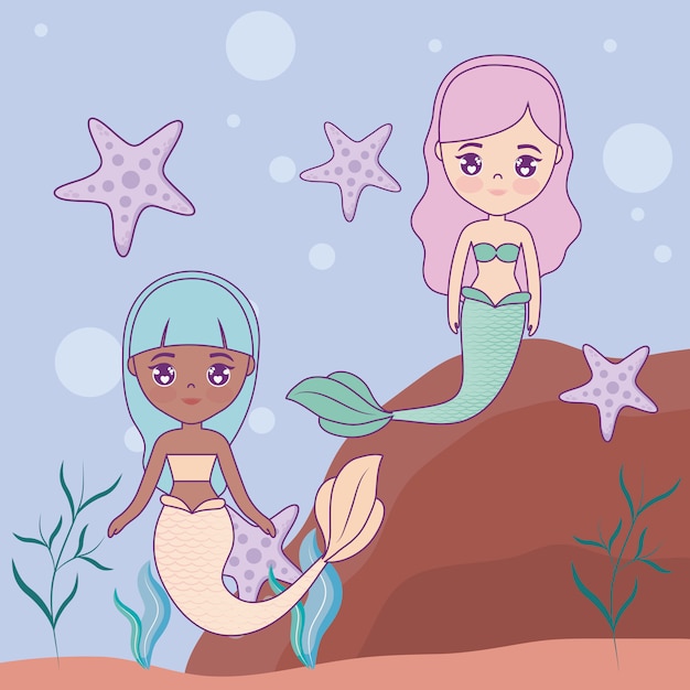 Cute mermaids in the sea