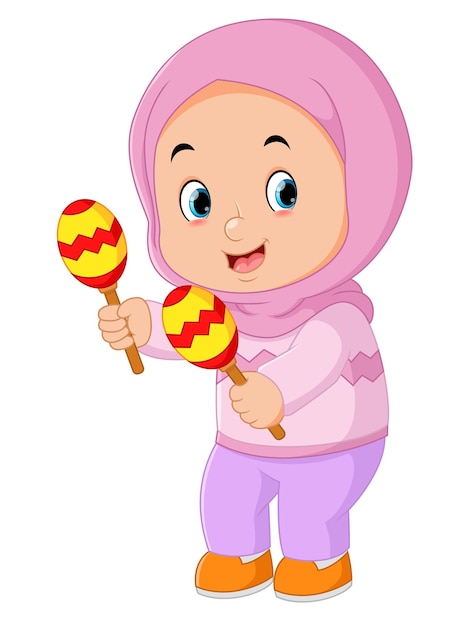 A cute Muslim girl playing a maracas musical instrument