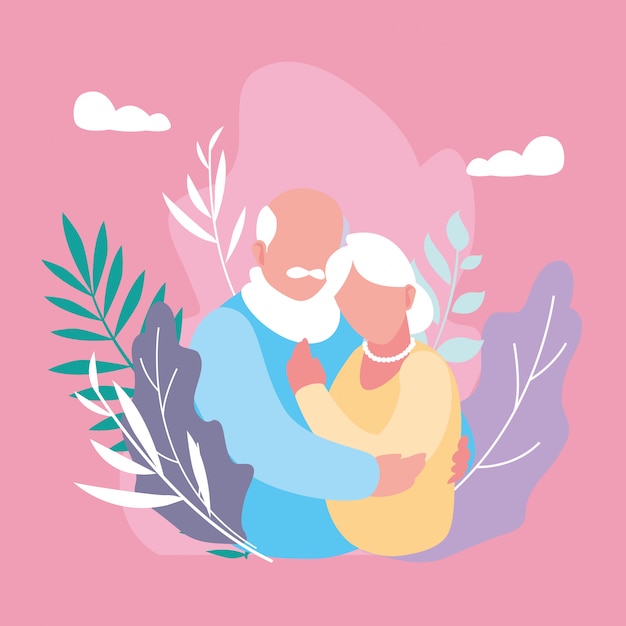 Cute old couple hugged with leafs decoration