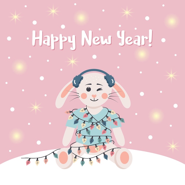 Cute rabbit in winter headphones is wrapped in a garland winter card with shining lights and snow