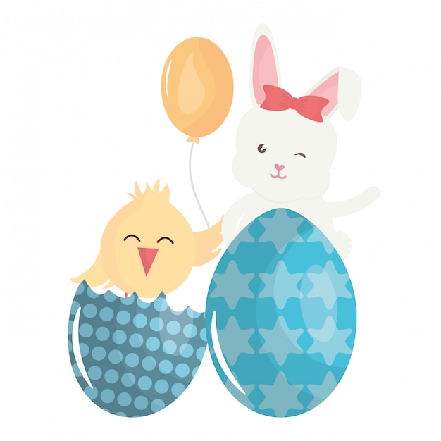 Cute rabbit with easter egg painted and chick