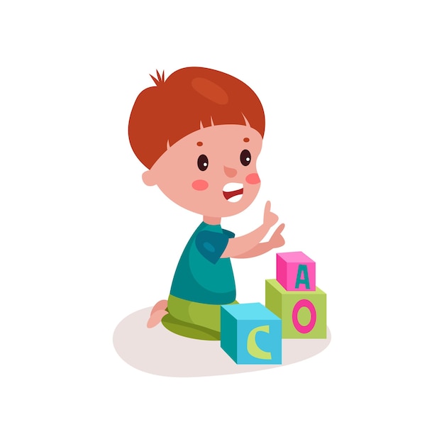 Cute redhead little boy sitting on the floor playing with block toys, kid learning through fun and play colorful cartoon vector illustration on a white background