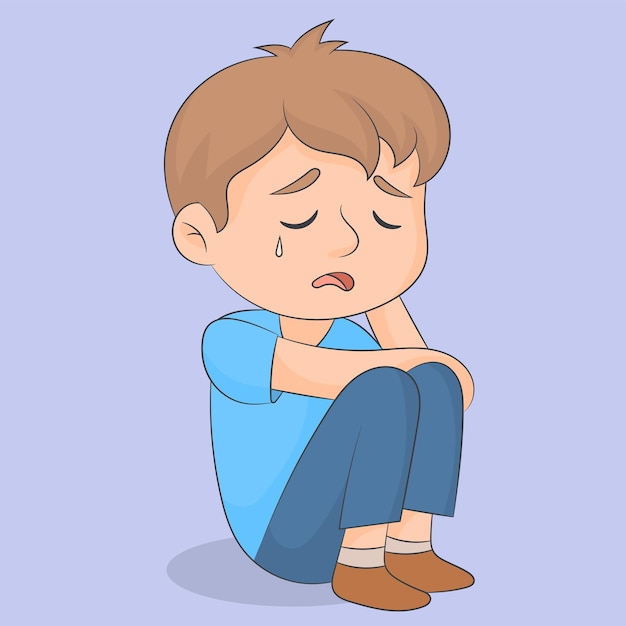 Cute sad kid boy sitting alone crying