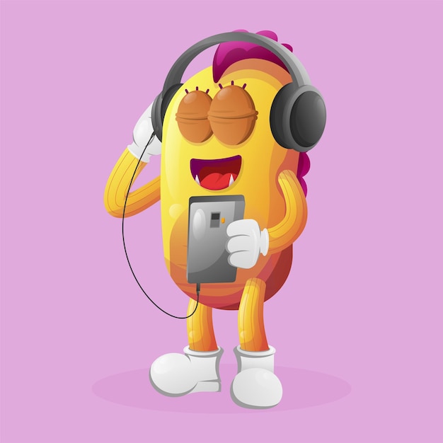 Vector cute yellow monster listening music on a smartphone using a headphone