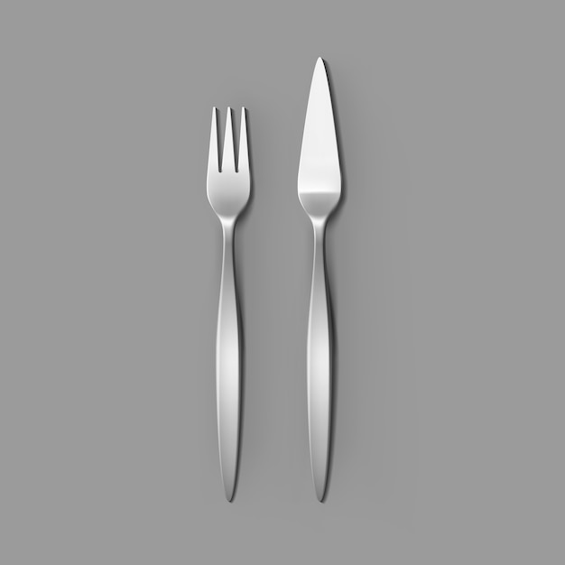 Cutlery set of silver fish fork and fish knife isolated, top view