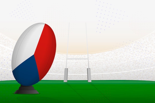 Czech republic national team rugby ball on rugby stadium and goal posts preparing for a penalty or free kick