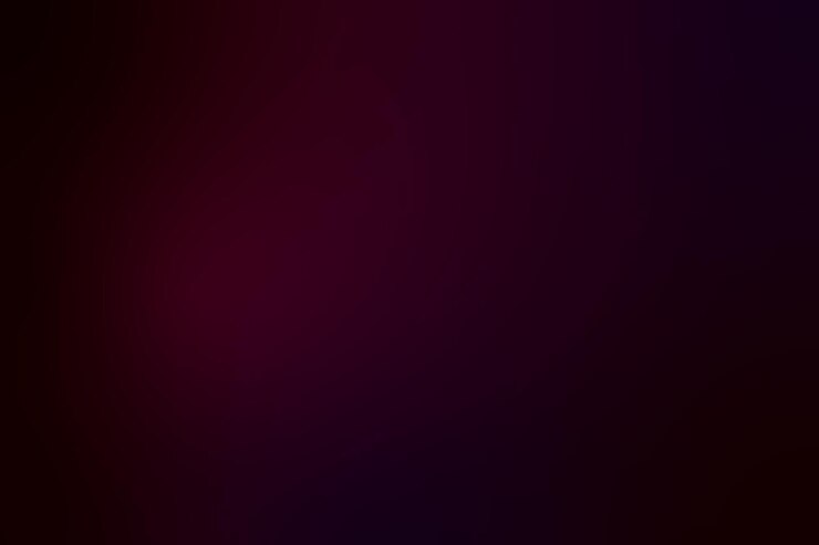 A dark background with a purple background with a red light
