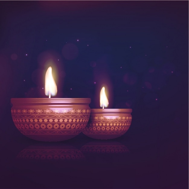 Vector dark diwali background with two burning candles