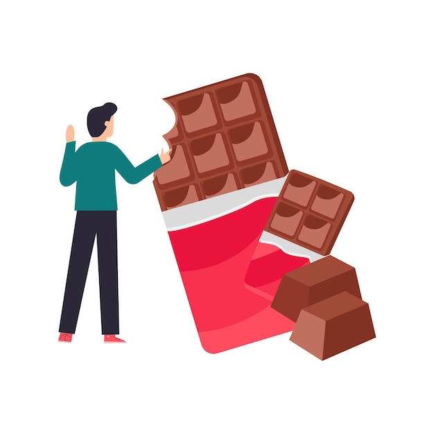 De jongen eet chocolade.