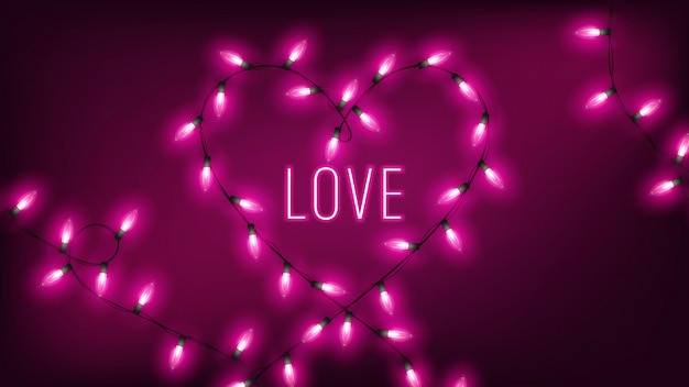 De roze feelichten in hartvorm hangen op donkere achtergrond met neontekst