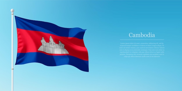De vlag van Cambodja zwaait tegen de heldere blauwe lucht Copyspace