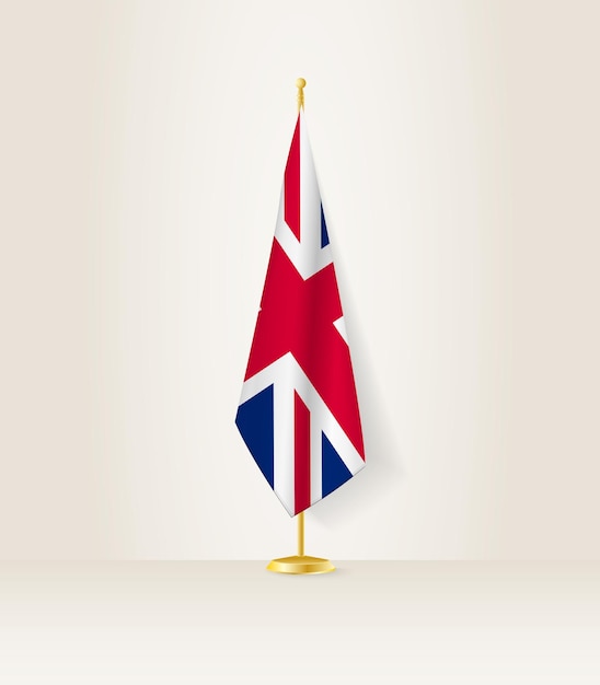 Vector de vlag van het verenigd koninkrijk op een vlaggenstandaard