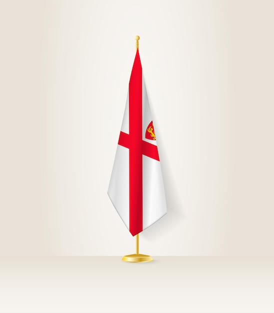 De vlag van Jersey op een vlaggenstandaard