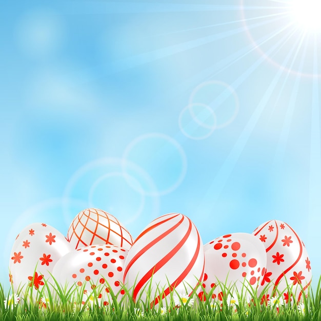 Vector decorative easter eggs with red patterns in the grass and blue sky, illustration.