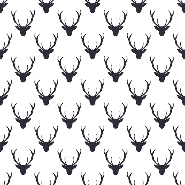 Vector deer head pattern. wild animal symbols seamless background. silhouette monochrome design