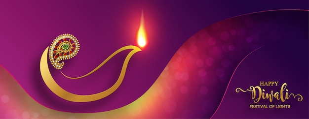 Diwali, deepavali o dipavali il festival delle luci dell'india con il diya dell'oro modellato e cristalli sul fondo di colore di carta.