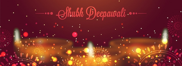 Diwali (Indian festival of lights web banner design with illuminated oil lit lamps on background and and shiny mandala design on maroon background.