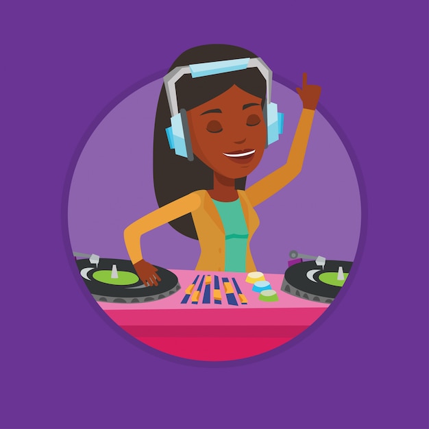 DJがターンテーブルで音楽をミキシングします。