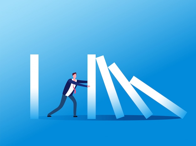 domino effect. businessman stopping falling domino.