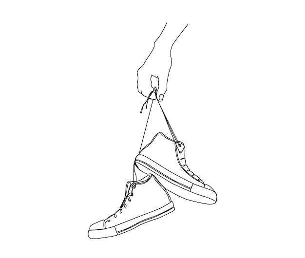 Doorlopende lijntekening van hand met sneakers Modieuze en casual sneakers lijntekeningen vectorontwerp tekenen