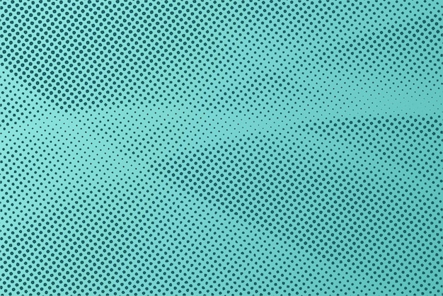 Dotted halftone pattern on turquoise background Abstract retro pop art texture