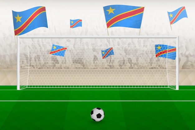Болельщики футбольной команды ДР Конго с флагами ДР Конго аплодируют на стадионе