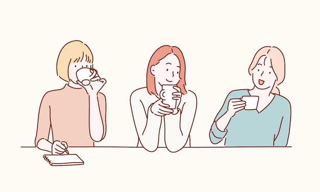 Drie mensen drinken koffie en een van hen drinkt koffie.