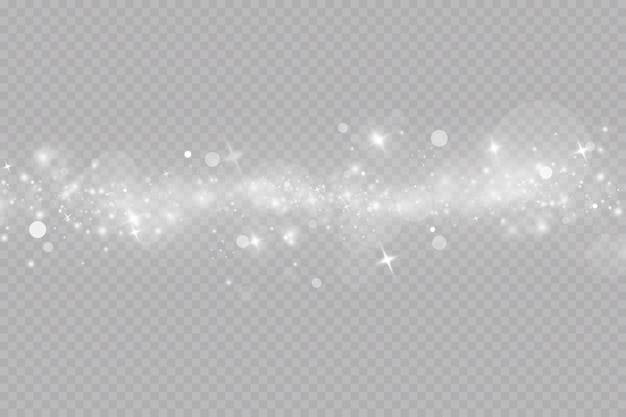 Dust sparks and stars shine with a special light. Christmas light effect. Glittering particles