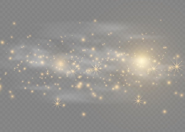 ほこりの白い白い火花と金色の星が特別な光で輝いています