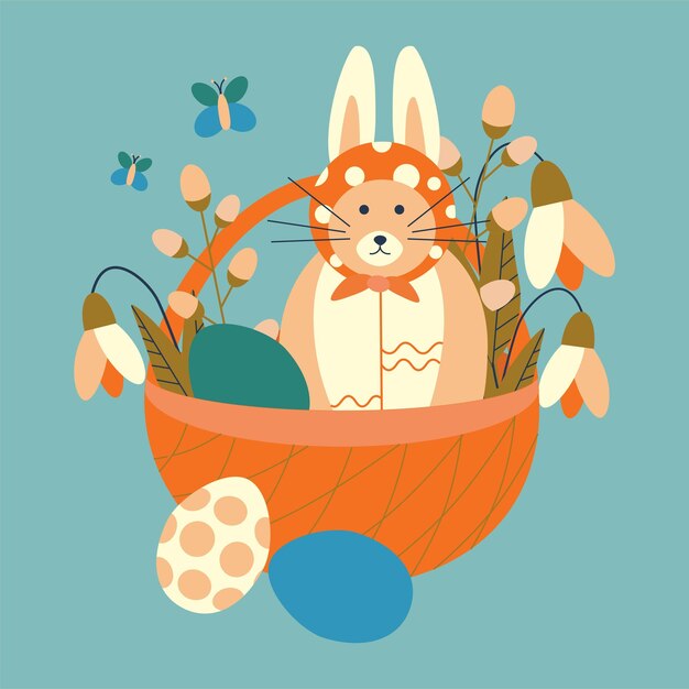 Easter basket with eggs a cat with rabbit ears and snowdrop flowers